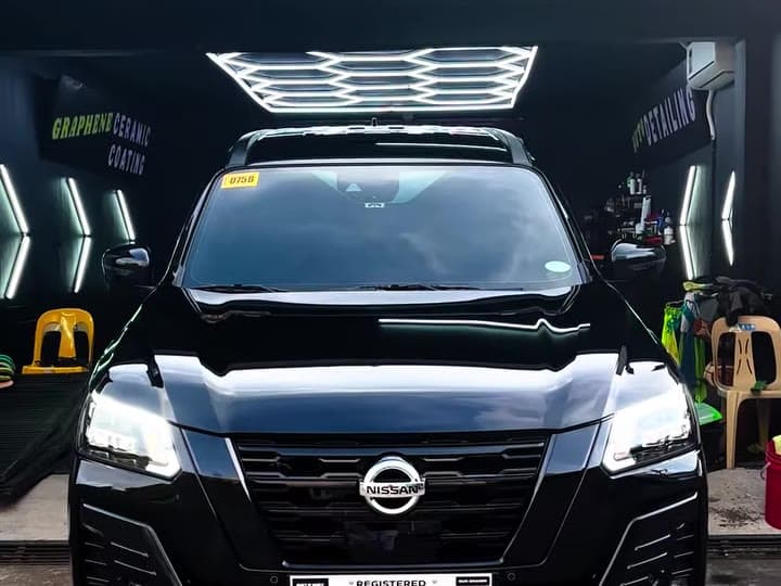 Nissan Terra under the hexagon lights in the CarLab studio